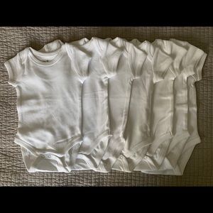 7 brand new pact onesies